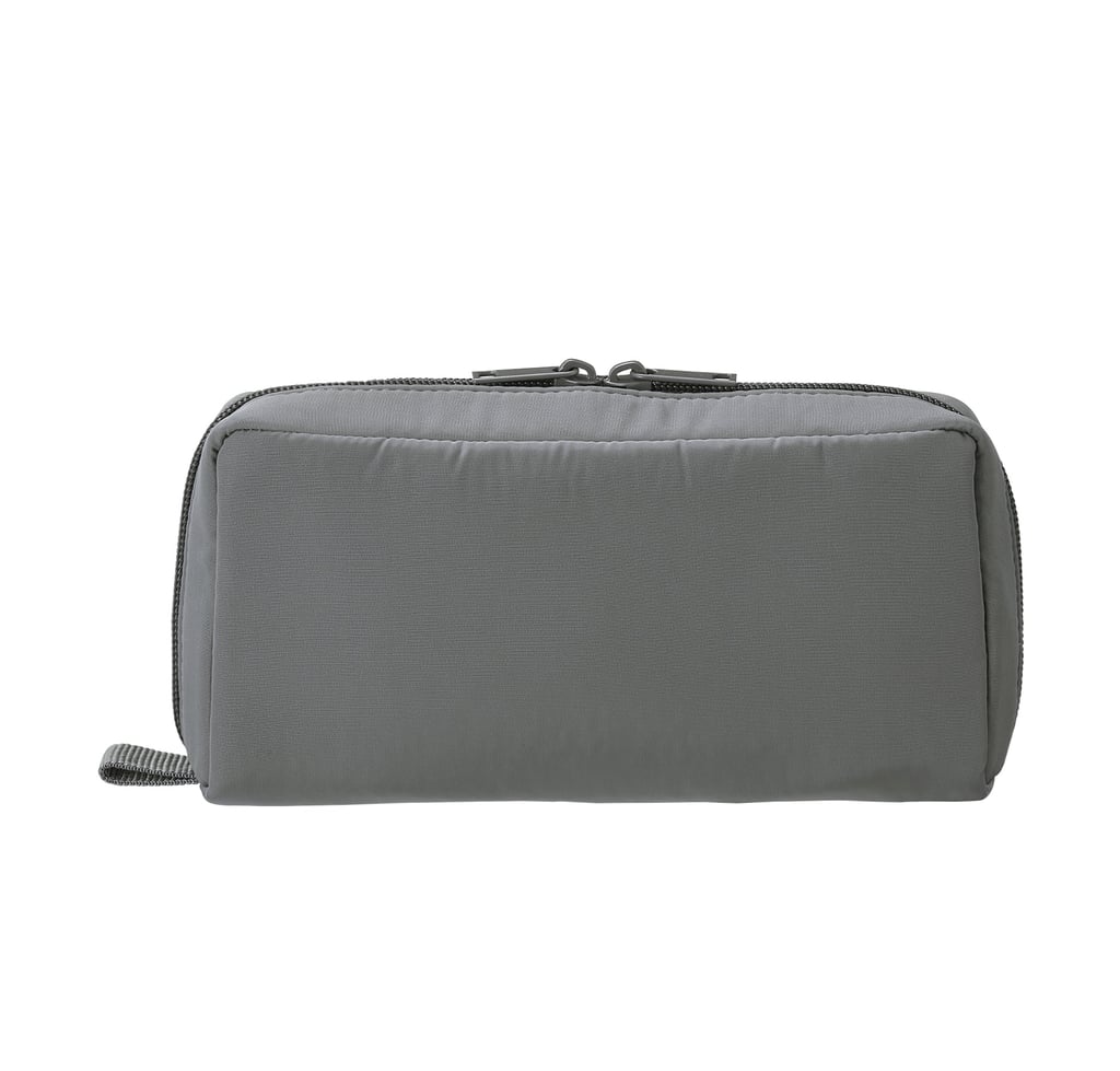Muji Polyester Gadget Pouch ($12)
If I have to scrounge through the deepest depths of my carry-on bag one more time to find my phone charger, I may scream. A pouch to specifically organize my plethora of cords and chargers will finally (hopefully) resolve that never-ending headache.