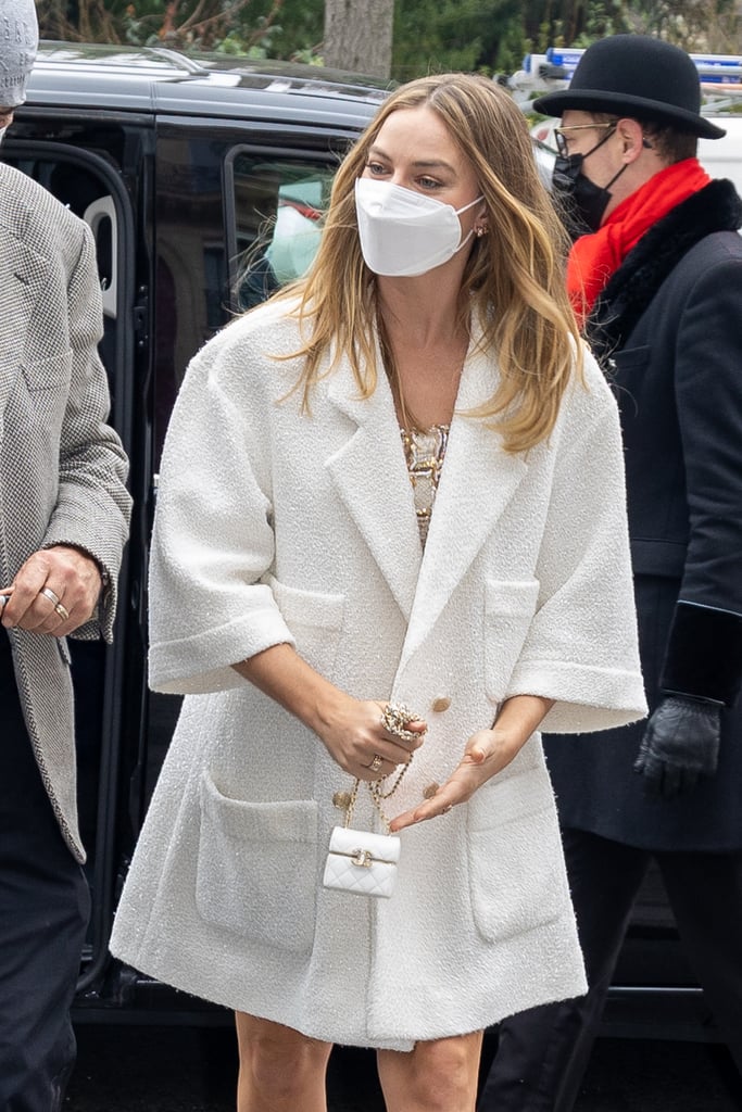 Margot Robbie Wears Chanel AirPods Case as a Purse in Paris