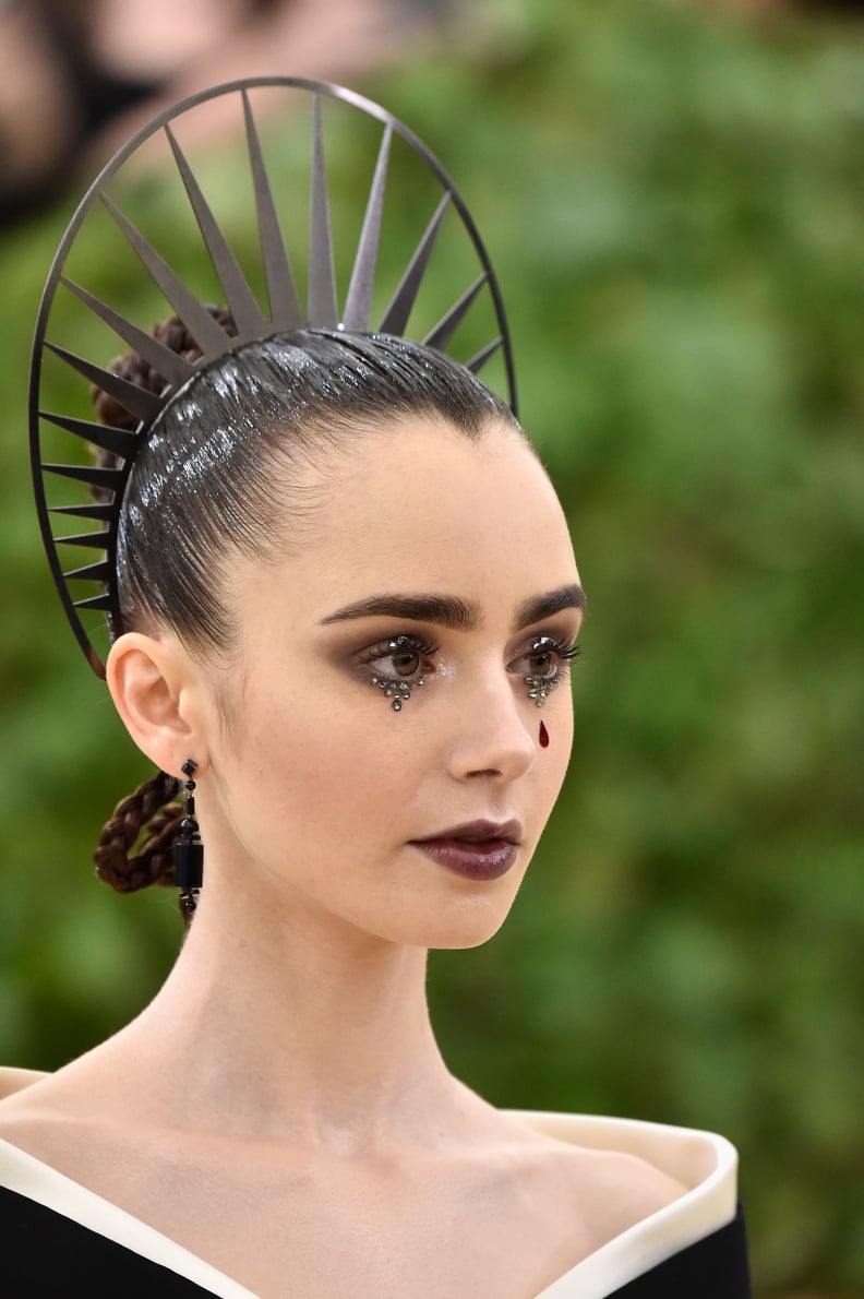 Lily Collins's Dark Art Inspiration at the Met Gala