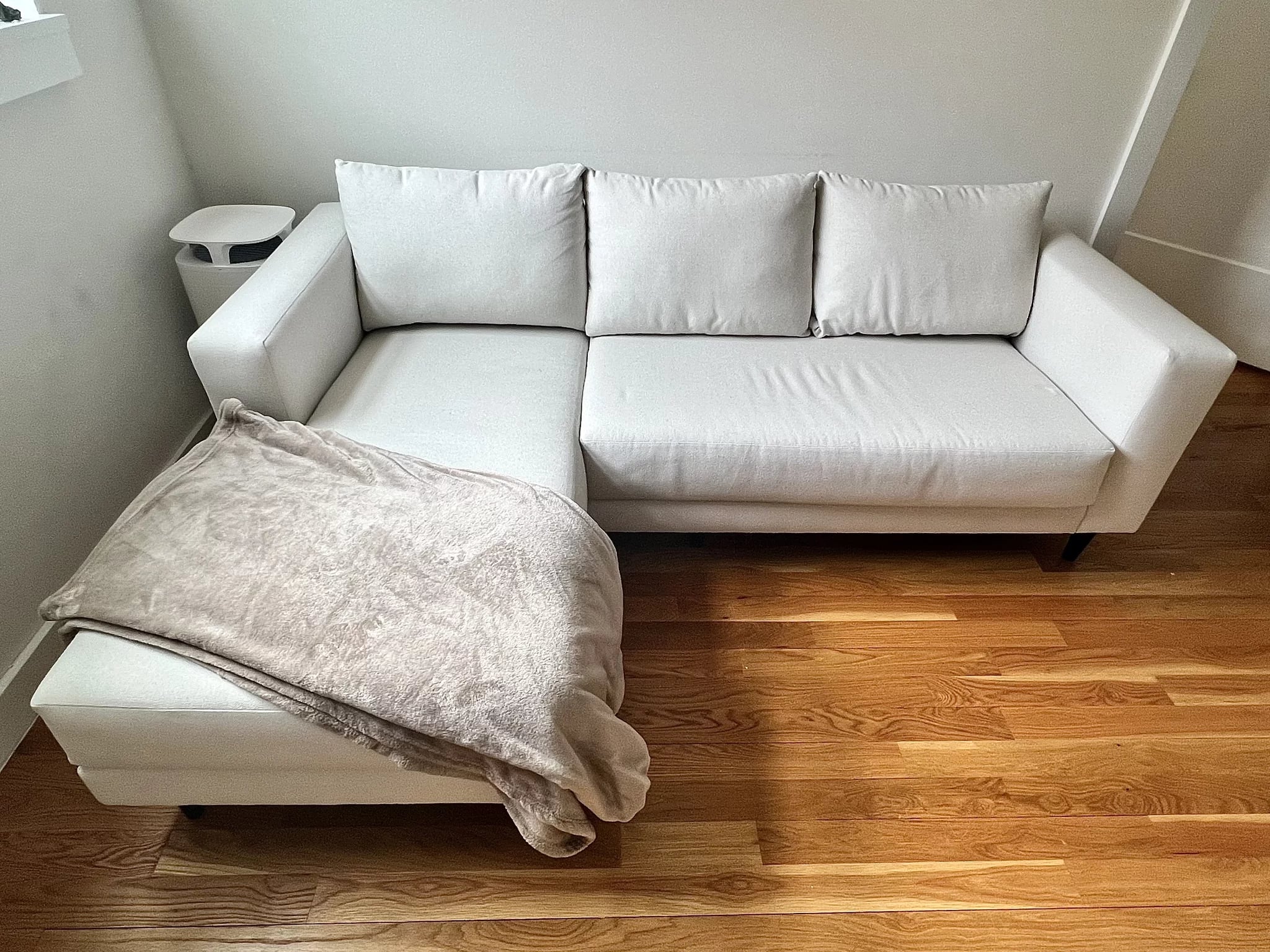 How to Keep A White Sofa Looking (Almost) New, Even With Pets