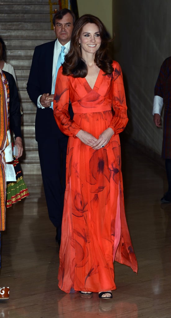 During her trip to Bhutan, Kate chose ethical label Beulah London to design her custom vibrant diaphanous gown, featuring the country's national flower, the poppy.