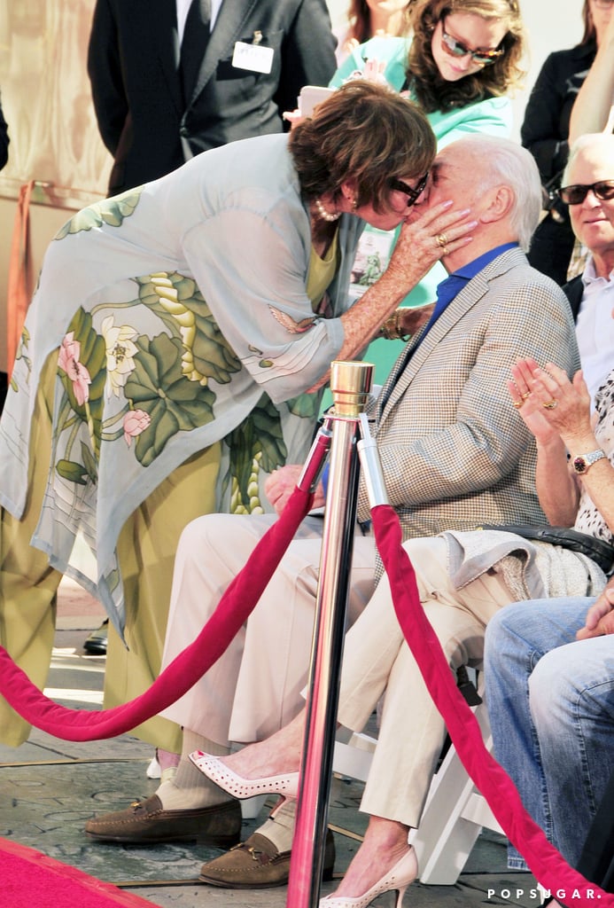 Shirley MacLaine gave Christopher Plummer a sweet kiss at his hand and footprints ceremony at LA's TCL Chinese Theatre on Friday.