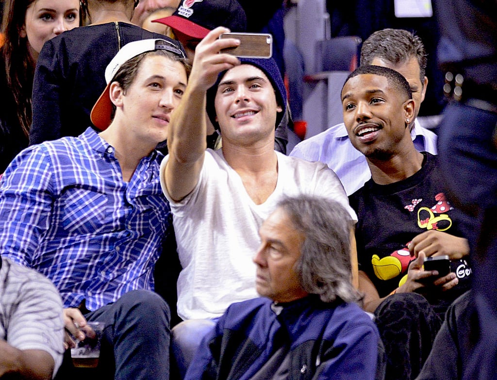Miles Teller, Zac Efron, and Michael B. Jordan took a selfie together while watching the Lakers play the Miami Heat in Miami on Thursday.