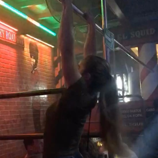 Woman Does Pull-Ups at a Bar