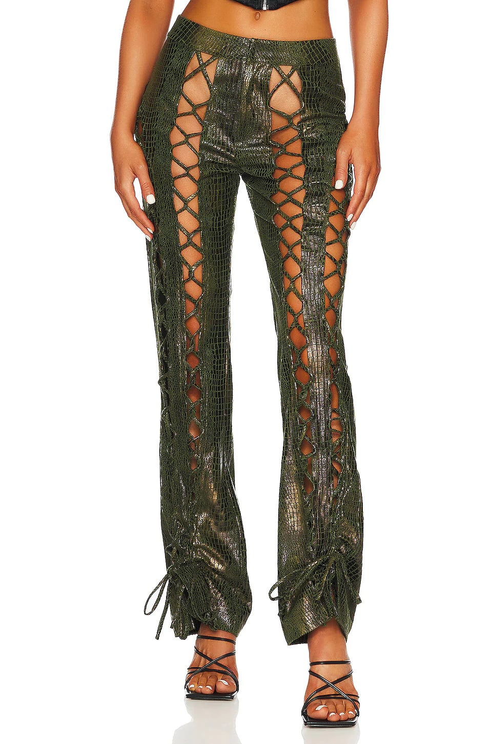 Megan Fox Wears Lace Up Croc Pants by 