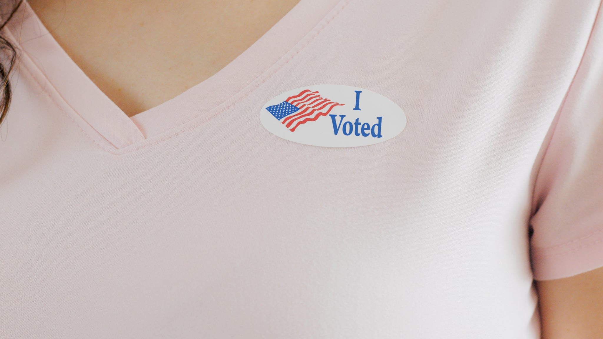 Woman wearing I Voted sticker