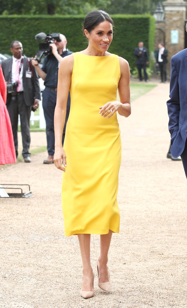 Possibly shining brighter than the sun, Meghan stepped out for the Commonwealth youth reception in July 2018 wearing a high-neck midi yellow Brandon Maxwell dress. She completed her look with neutral heels and Adina Reyter earrings.