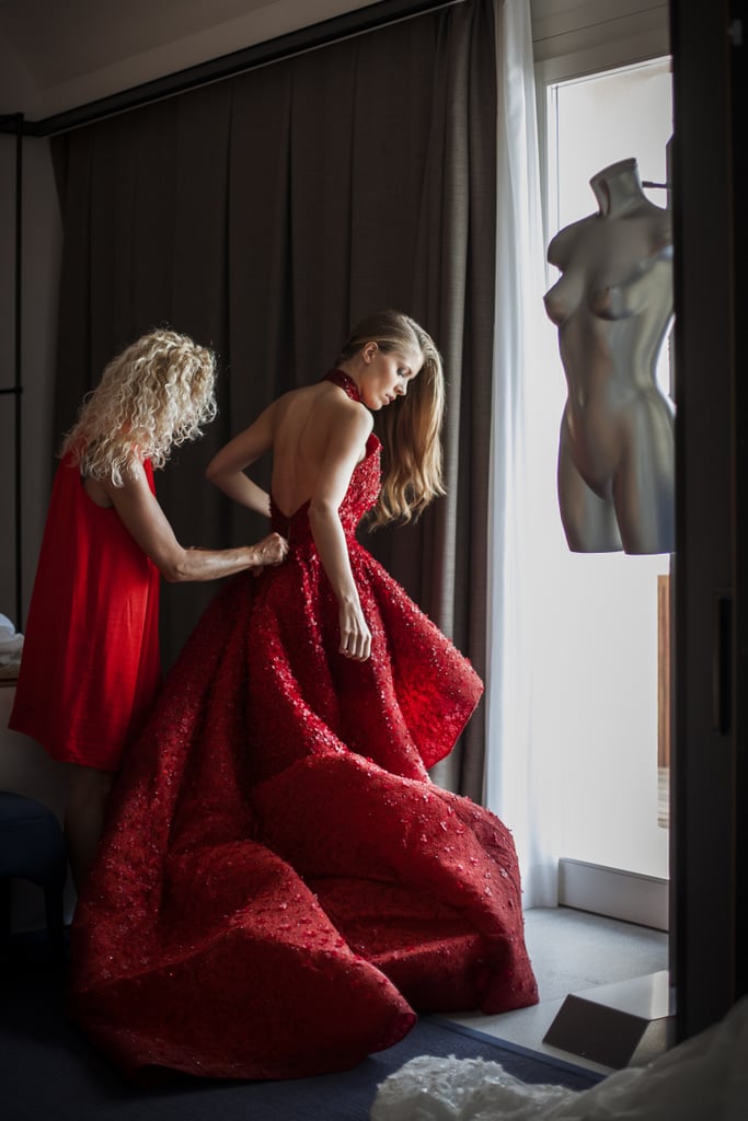 For the welcome dinner, Victoria Swarovski wore a red Michael Cinco gown.
