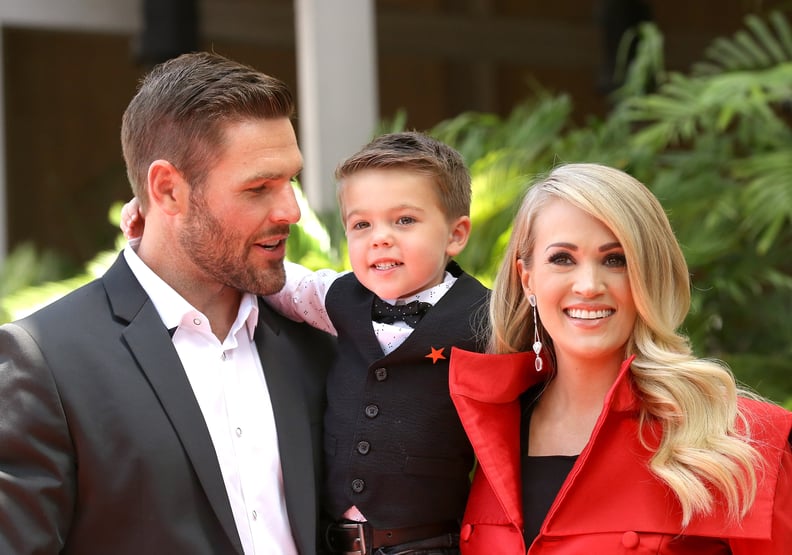 HOLLYWOOD, CA - SEPTEMBER 20:  Carrie Underwood with her husband, Mike Fisher and their son, Isaiah Michael Fisher attend the ceremony honoring Carrie Underwood with a Star on The Hollywood Walk of Fame held on September 20, 2018 in Hollywood, California.