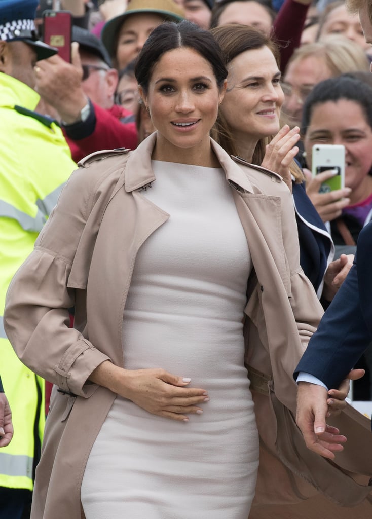 Meghan Markle Touching Baby Bump Pictures