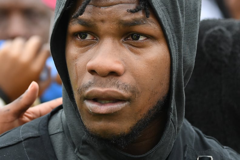 TOPSHOT - British actor John Boyega takes part in an anti-racism demonstration in London, on June 3, 2020, after George Floyd, an unarmed black man died during an arrest in Minneapolis, USA. - Londoners defied coronavirus restrictions and rallied today in