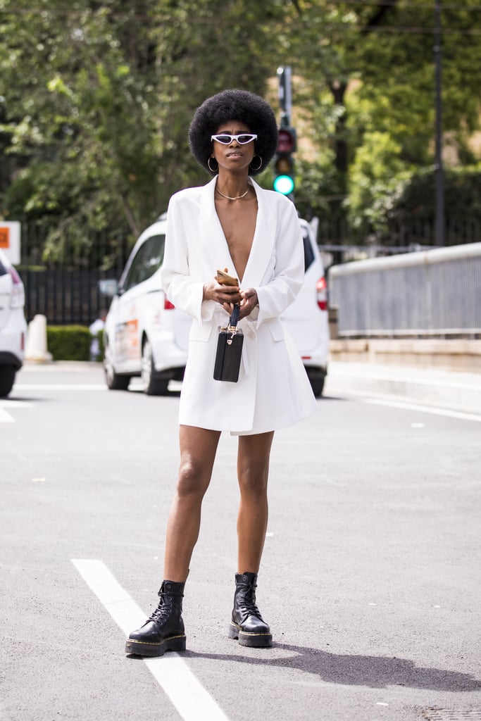 Style a white blazer minidress with matching sunglasses and black combat boots.