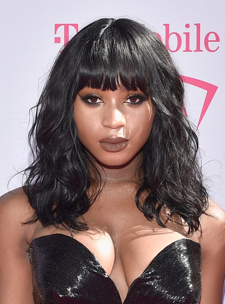 But she can also pull off shaggy bangs (and wears True Brown K so well