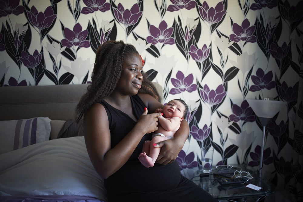 This mother exudes maternal strength and beauty.