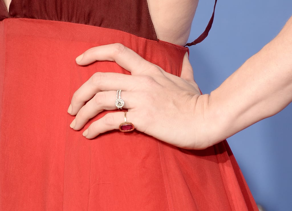 Amy's nails were painted by Tom Pecheux, who opted for a very clean, classic nail look. L'Oréal Paris Colour Riche Nail Collection Privee in Eva's Nude was applied in two coats.