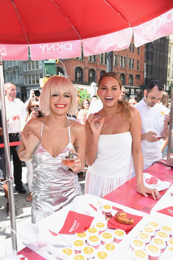 Rita Ora and Chrissy Teigen brought infectious energy to the launch of DKNY's MYNY fragrance launch event in NYC on Tuesday.