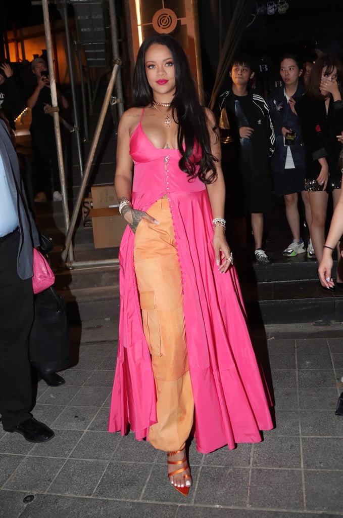 Rihanna Wearing a Pink Dress and Orange Pants in Seoul