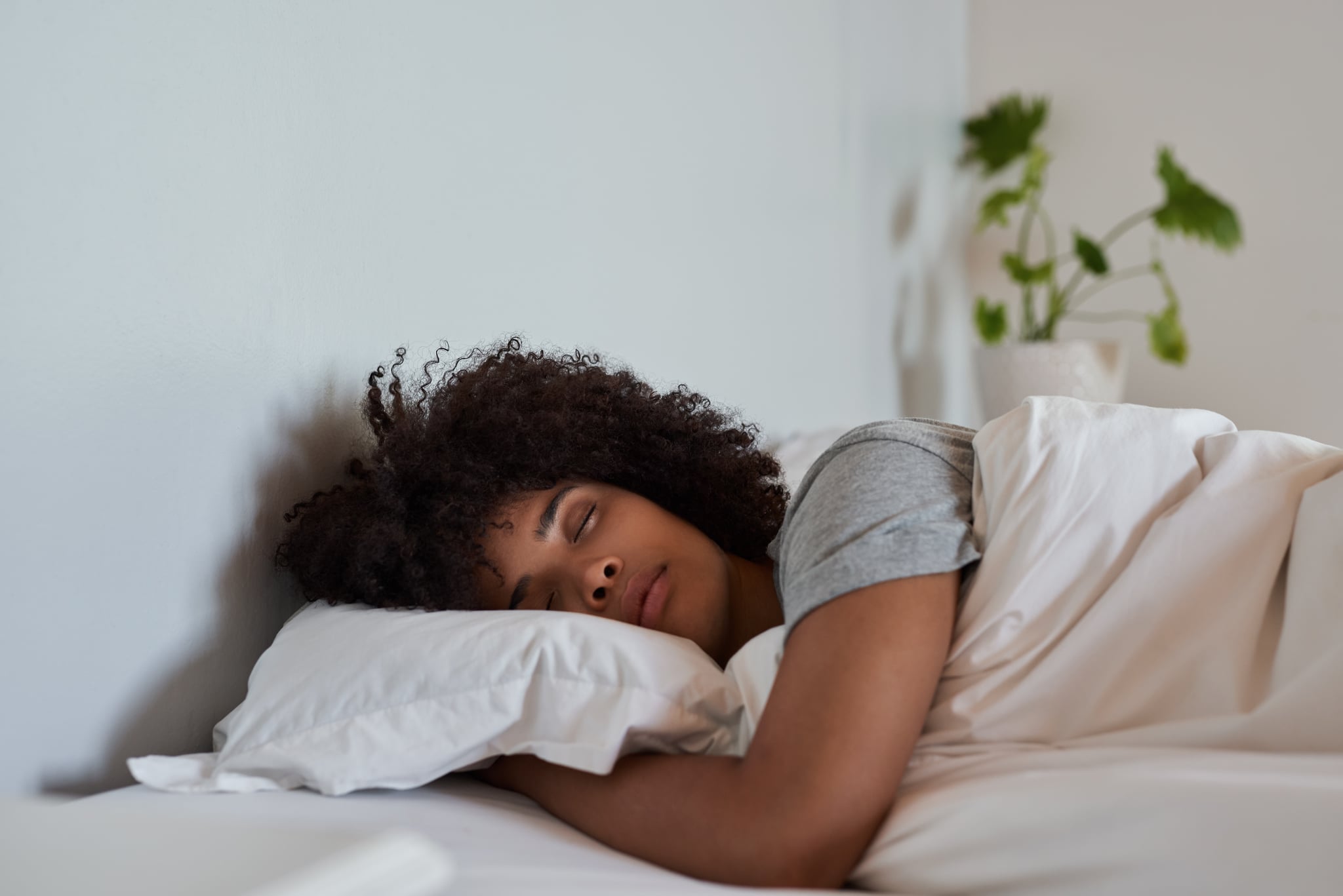 Woman sleeping in her bed at home. Woman sleeping in her bed at home.