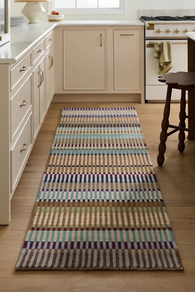 Anthropologie Brooke Tufted Wool Striped Rug ($98)
Sometimes back-to-school energy can translate into "I should redesign my entire house" energy. Instead of replacing all your furniture, start with small, strategic swaps, like a new area rug. This striped print adds dimension and color to any room while the wool fabric makes it ideal for high-traffic areas.