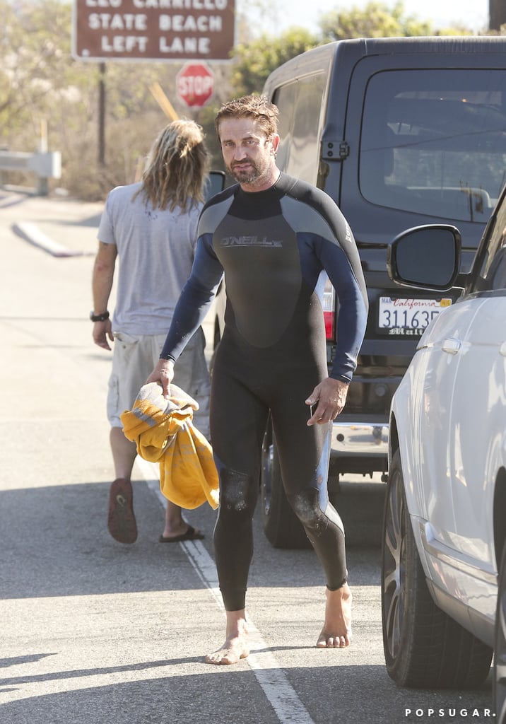 Gerard Butler suited up for the surf in LA on Friday.