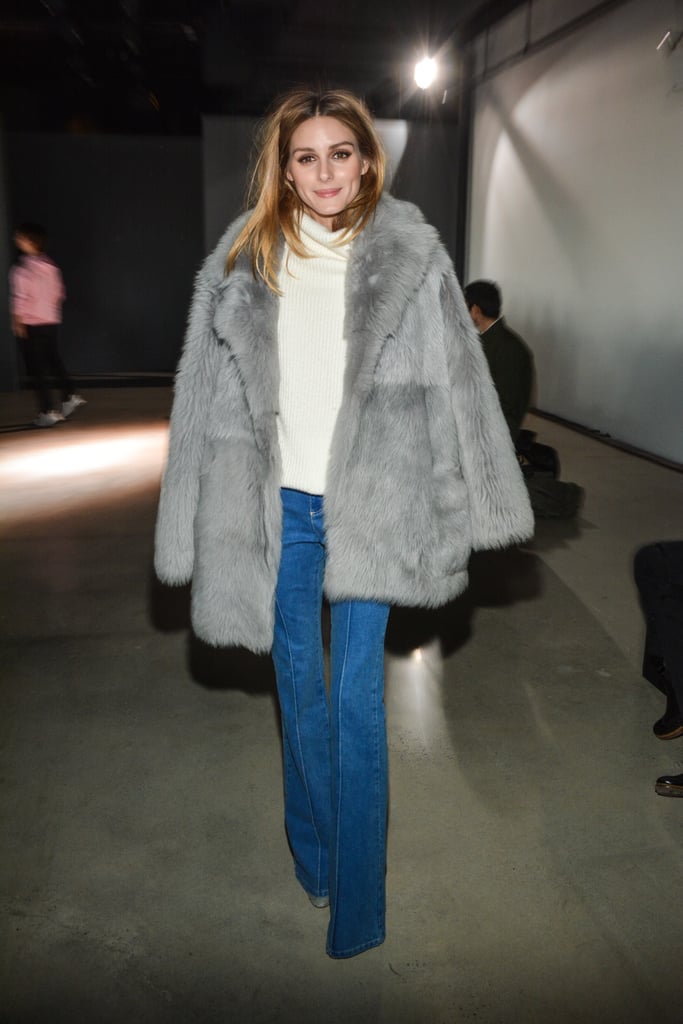 The style star kept it understated in flared jeans and a Tibi coat at the Tibi Fall show.