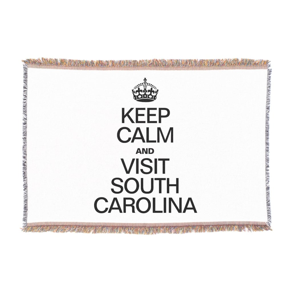 Wrap yourself in a playful blanket like this "Keep Calm and Visit South Carolina" throw ($98).
