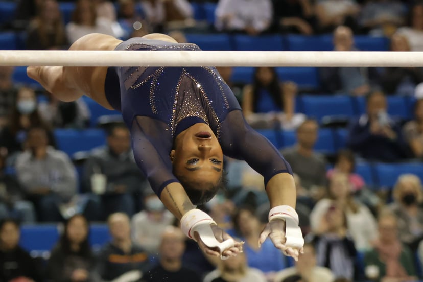 LOS ANGELES, CALIFORNIA - MARCH 11: Jordan Chiles of the UCLA Bruins competes on uneven bars against the Iowa State Cyclones at UCLA Pauley Pavilion on March 11, 2023 in Los Angeles, California. (Photo by Katharine Lotze/Getty Images)