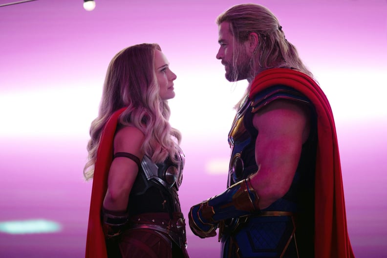THOR: LOVE AND THUNDER, from left: Natalie Portman as Mighty Thor, Chris Hemsworth as Thor, 2022. ph: Jasin Boland / Walt Disney Studios Motion Pictures /  Marvel Studios / Courtesy Everett Collection