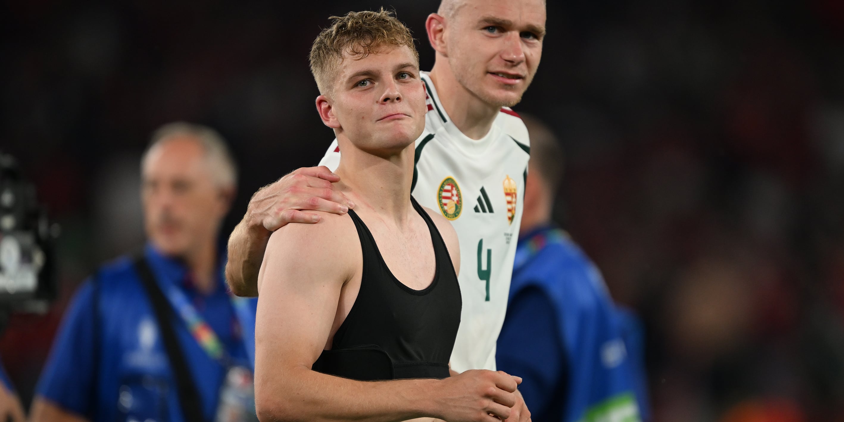 Male soccer players wearing sports bras top