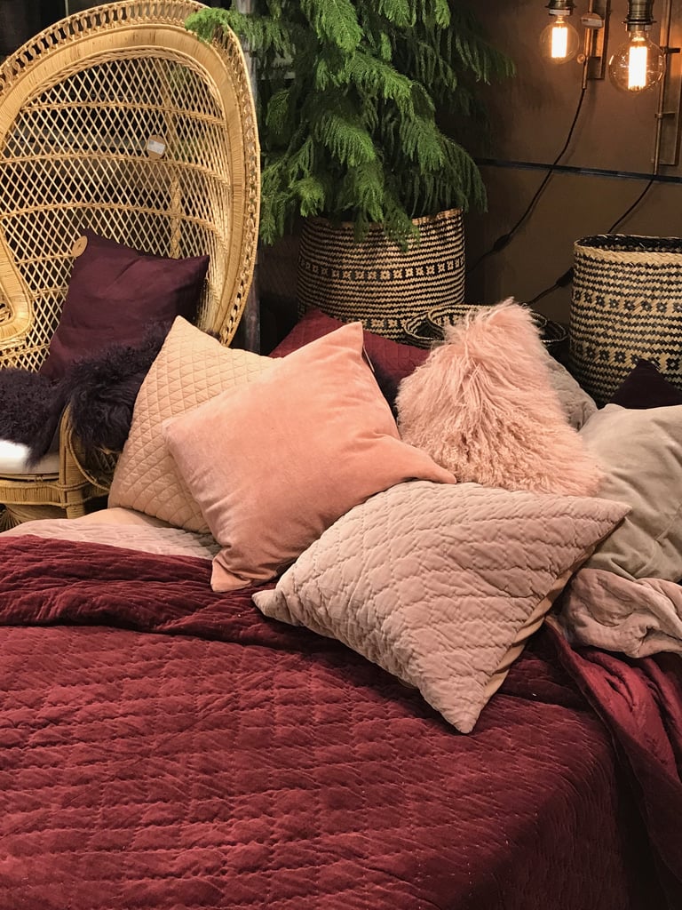 Want to make the trendy hue feel fresh for 2018? Nancy says the newest way to decorate with millennial pink is by mixing it with berry. It's perfect for Fall. "Add some fake fur or some awesome fringe for unique detailing," she said.