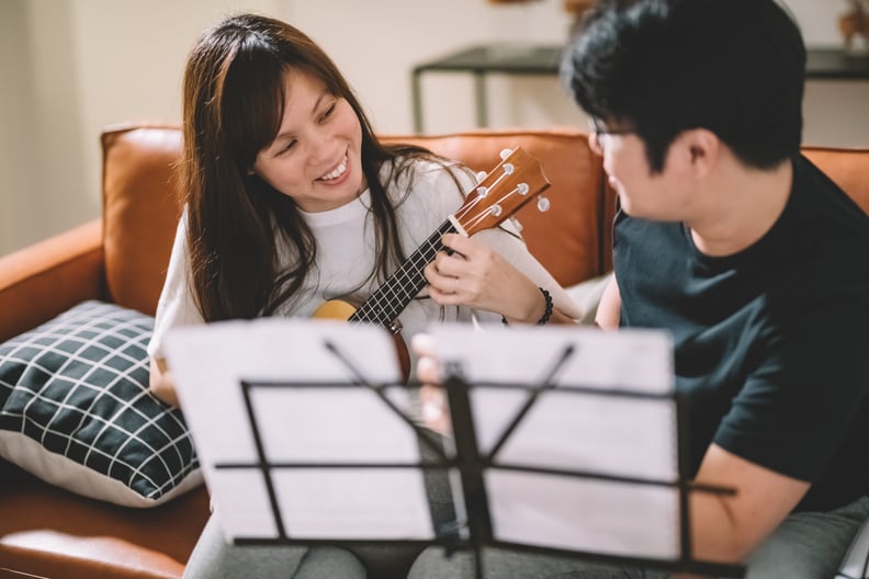 Learn to play the ukulele together.