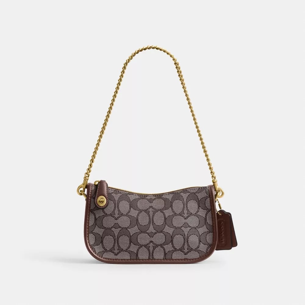 Coach Swinger Bag 20 With Chain In Signature Jacquard ($195)
"This Coach bag is perfect for any look," Biggs tells me, adding that it's the "perfect sidekick" — and Popsugar editors couldn't agree more. With Coach firmly in its trend renaissance era, this gold-chain monogram style feels like peak right-now fashion.