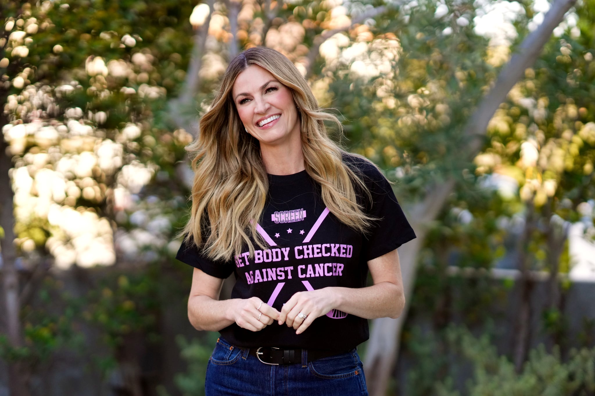 Erin Andrews get body checked against cancer.
