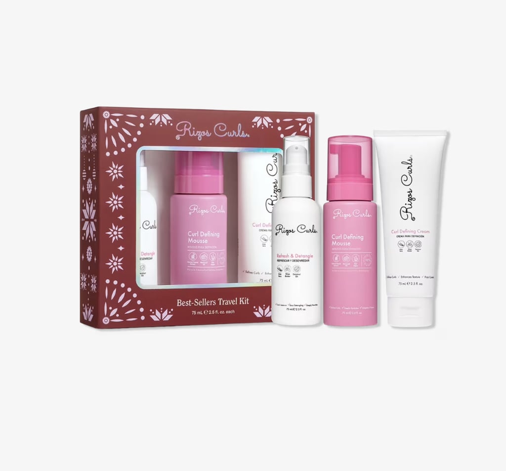 Rizos Best-Sellers Travel Kit ($14, originally $20)
For those with curly hair, this bestseller kit from Rizos is probably your best bet this Cyber Monday. Suitable for all hair types, it includes the brand's Refresh & Detangle spray, Curl Defining Mousse, and Curl Defining Cream, all to revive your curls and fight frizz. Another plus? They're the perfect size to take on your next vacation.