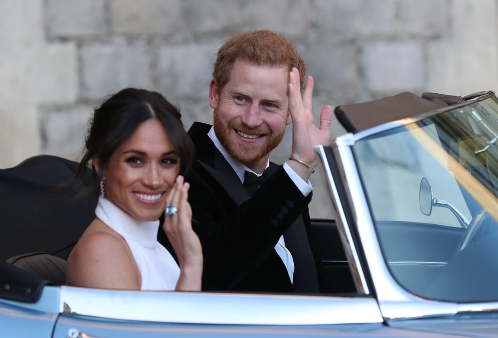 Of course, the duo didn't simply walk to Frogmore House for the reception — they arrived to the party in style, rolling up in an old-school, light-blue Jaguar. Meghan flashed a smile at the cameras and showed off her "something blue," an eye-catching, square gemstone ring that belonged to Princess Diana. It perfectly coordinated with the sky-colored hue of the car, if we do say so ourselves.