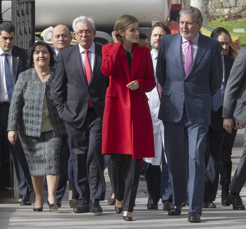 A Red Jacket Makes You Stand Out in a Sea of Gray Suits