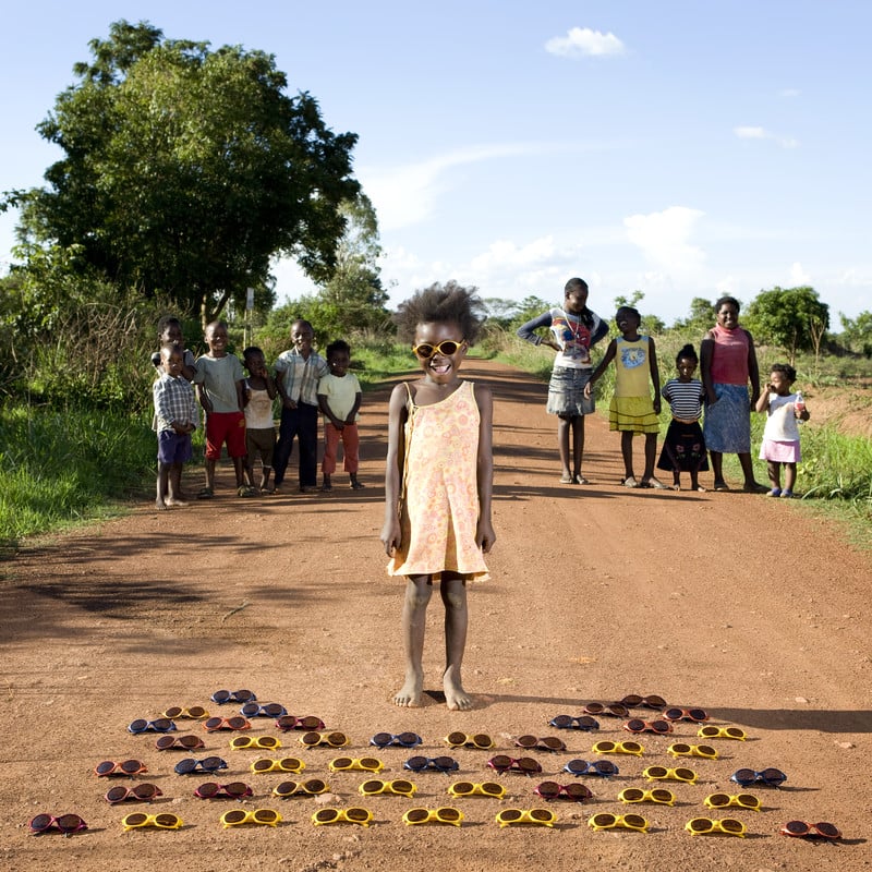 In addition to their favorite toys, the children came with special stories about their prized possessions. There was one moment in particular that Galimberti found extremely memorable. 
"I was in this little village in the north part of Zambia, a place where there is almost nothing," Galimberti recalls. "No electricity, no running water, and of course no toy stores." For these children, Galimberti notes, playtime means running outside with other kids and creating toys out of the things they find in nature. He had all but given up hope on finding a suitable subject, but luck — and perhaps a not-so-secure truck — was on his side.  
"Maudy had found a box full of sunglasses on the ground along the main road," Galimberti says, noting that the box most likely fell off a truck, "so all the children of the village were playing with these glasses." The children were delighted to have something other than sticks and stones to play with, even if it wasn't a typical toy.
Source: Gabriele Galimberti/INSTITUTE