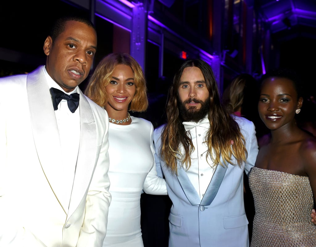 Beyoncé and Jay Z made their way to Vanity Fair's post-Oscars bash on Sunday, making a brief appearance on the red carpet before mingling with Hollywood's hottest stars. Beyoncé wore a floor-length white dress, and inside, she linked up with everyone from her sister, Solange, to Jennifer Lopez to Jared Leto and Lupita Nyong'o. Earlier in the night, she sweetly posted a picture of Solange's Oscars outfit, writing, "Gorgeous," and during the party, she posed with Lupita's brother for an Instagram snap. Lupita wrote, "Just introduced my brother to @beyonce. What are sisters for?!" Check out some must-see snaps of Beyoncé and Jay Z's night out, and then see all the stars at Vanity Fair's Oscars afterparty!