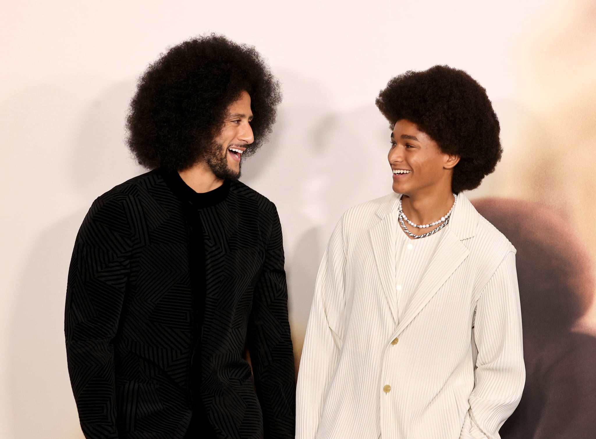 LOS ANGELES, CALIFORNIA - OCTOBER 28: Colin Kaepernick (L) and Jaden Michael arrive at the Los Angeles premiere of Netflix's 