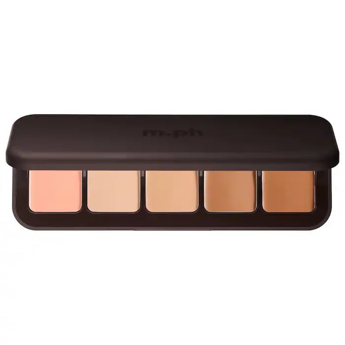 Mp.H Underpainting Face Highlight & Contour Palette ($64)
Mary Phillips is a celebrity makeup artist for stars like Hailey Bieber, Kendall Jenner, Dua Lipa, and more. She's known for popularizing the tried-and-true method of underpainting, and she launched her own face palette to make it easy. If you have someone makeup-obsessed on your list, this is sure to impress them. The five-pan palette features different shades to highlight and contour, creating a lifted, sculpted base for your makeup.Three of our editors put it to the test — check out our Mp.H Underpainting Face Highlight and Contour Palette review.
Editor Quote: "I used the color corrector under my eyes, highlighter on my forehead, nose, and chin, and cool-toned contour to sculpt my cheekbones, forehead, and jawline. The dual-ended brush works amazingly for blending in any location, and the pigments melt into skin for a subtle yet impactful effect. I applied a skin tint over it in tapping motions to prevent the placement of my contour and highlight from shifting, and was left with a naturally lifted look. After 12 hours of wear, my makeup still looked great and I experienced only minor creasing under my eyes." — Jessica Harrington, beauty section lead