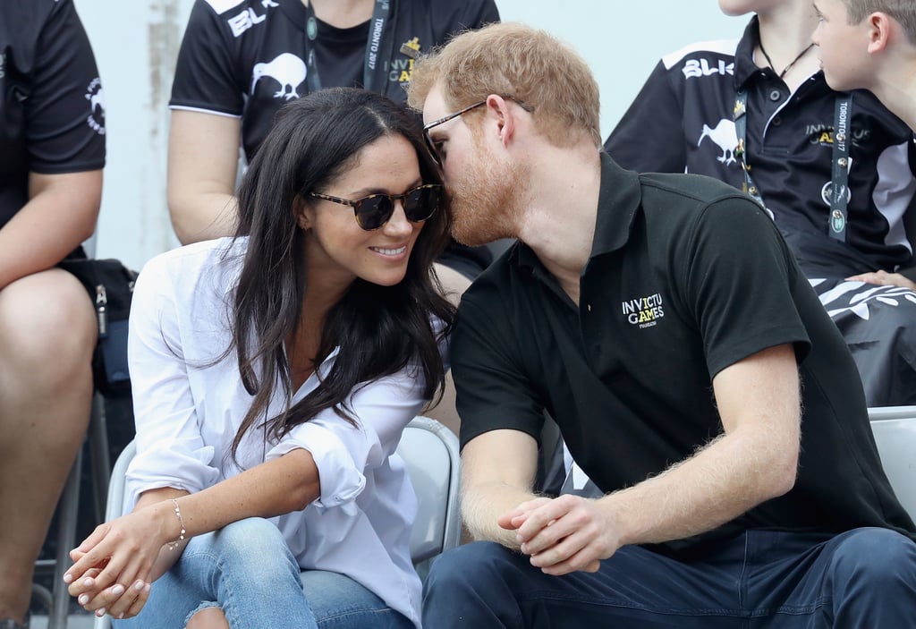 Prince Harry Whispering in Meghan Markle's Ear Pictures