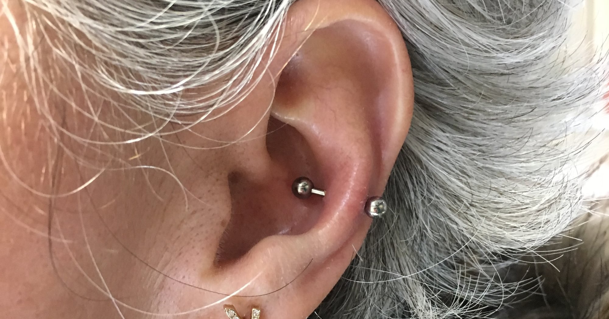 What to Know Before Getting A Snug Piercing: Expert Tips