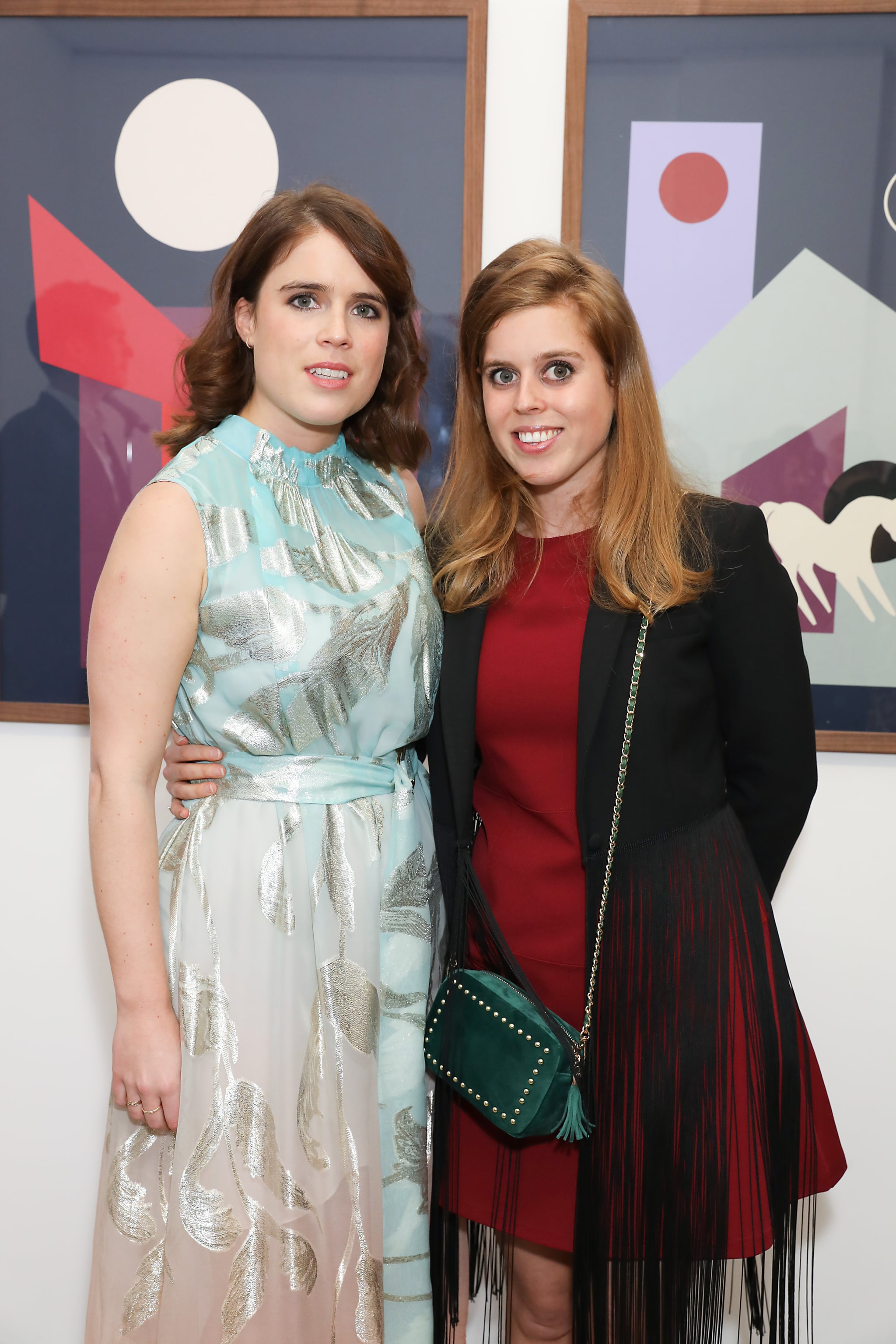 LONDON, ENGLAND - MAY 22: HRH Princess Eugenie of York (L) and HRH Princess Beatrice of York at the Animal Ball Art Show Private Viewing, presented by Elephant Family on May 22, 2019 in London, England. (Photo by David M. Benett/Dave Benett/Getty Images for Animal Ball)
