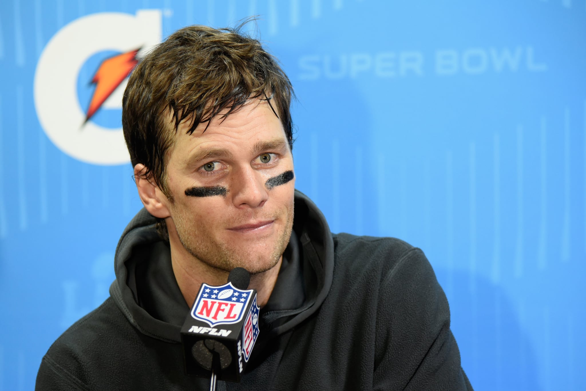 MINNEAPOLIS, MN - FEBRUARY 04:  Tom Brady #12 of the New England Patriots speaks to the media after losing 41-33 to the Philadelphia Eagles in Super Bowl LII at U.S. Bank Stadium on February 4, 2018 in Minneapolis, Minnesota.  (Photo by Larry Busacca/Getty Images)
