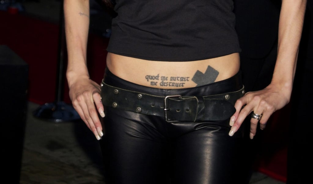 Cross and Latin Motto on Her Stomach