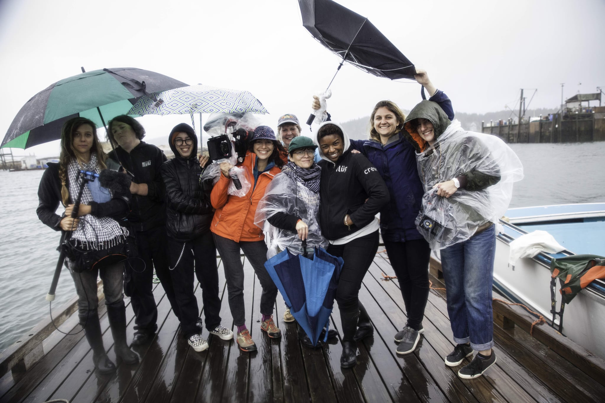 STONINGTON, ME 9/3/17 5:49:56 PM The crew with Julie Eaton after filming on her lobster boat in Stonington, Maine, on Sunday, September 3, 2017.  From left, Taylor Roy, Melissa McCollum, Emma Appel, Jenni Morello, Julie Eaton (back, lobster boat captain), Ana Veselic, Christine Wairegi, Alexandra Nikolchev and Jessica Chermayeff.  Photo by Sarah Rice