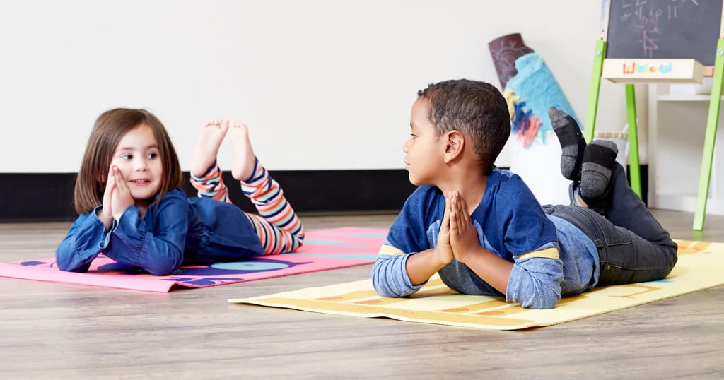 Adorable Kids Sitting on Yoga Mats and Giving High Five Stock Photo - Image  of cheerful, friendship: 210658494