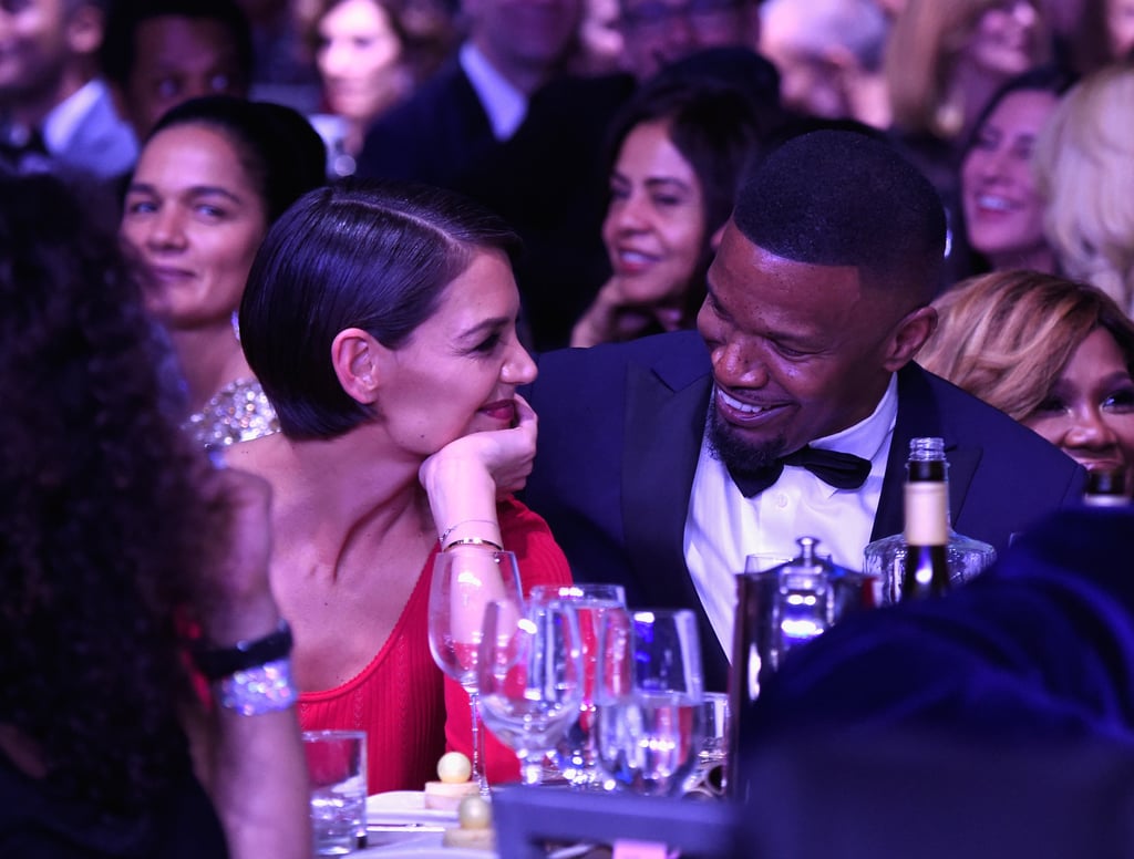 Katie Holmes and Jamie Foxx have been quietly dating since 2013, but they seem to be getting more and more comfortable showing off their romance. While neither Katie nor Jamie have officially confirmed their relationship, their recent outings pretty much speak for themselves. In September 2016, the couple was spotted holding hands while walking on the beach in Malibu, CA, and three months later, Katie stepped out to support at Jamie's store opening in NYC, just days before she helped him ring in his 50th birthday. The couple also linked up at Clive Davis's annual pre-Grammys bash this month, where they just couldn't seem to take their eyes off each other. We can't get over how happy they look together!