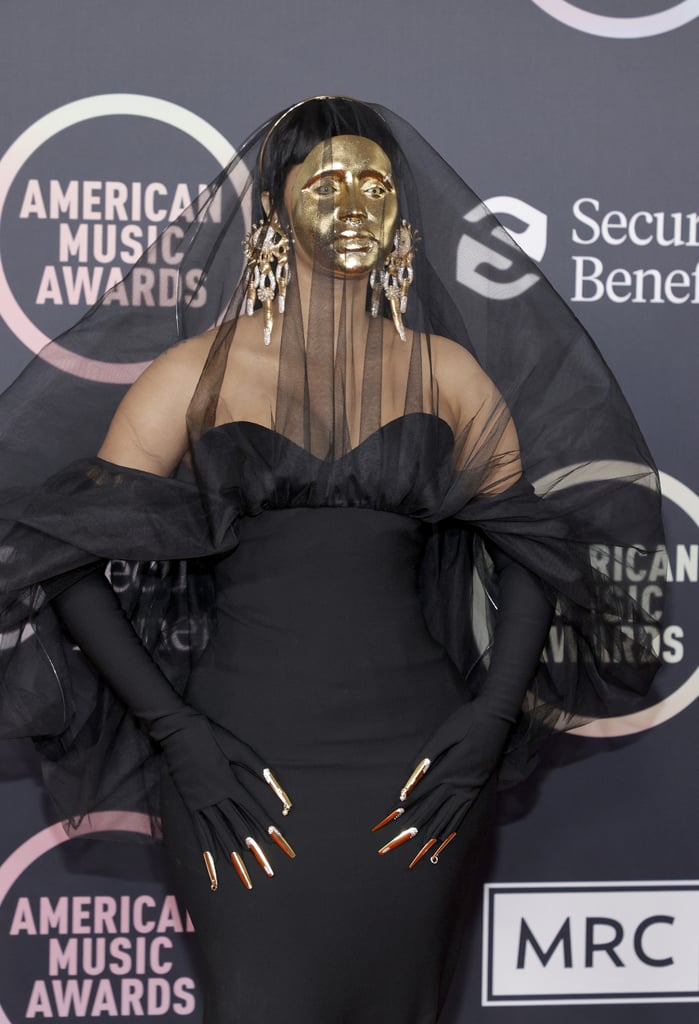 Cardi B Wears Manicure Over Gloves at American Music Awards