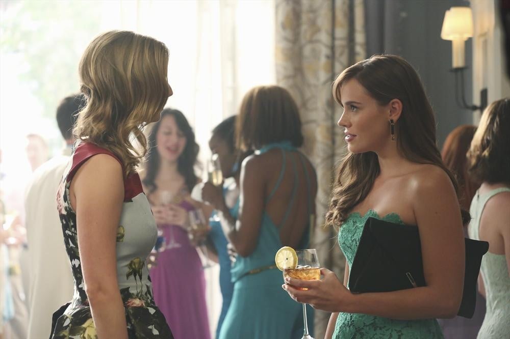 Emily and Charlotte (Christa B. Allen) stop to have a chat. Are they fighting or making up?